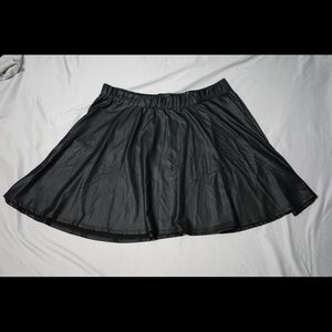 Black faux leather skater skirt. Size 2.